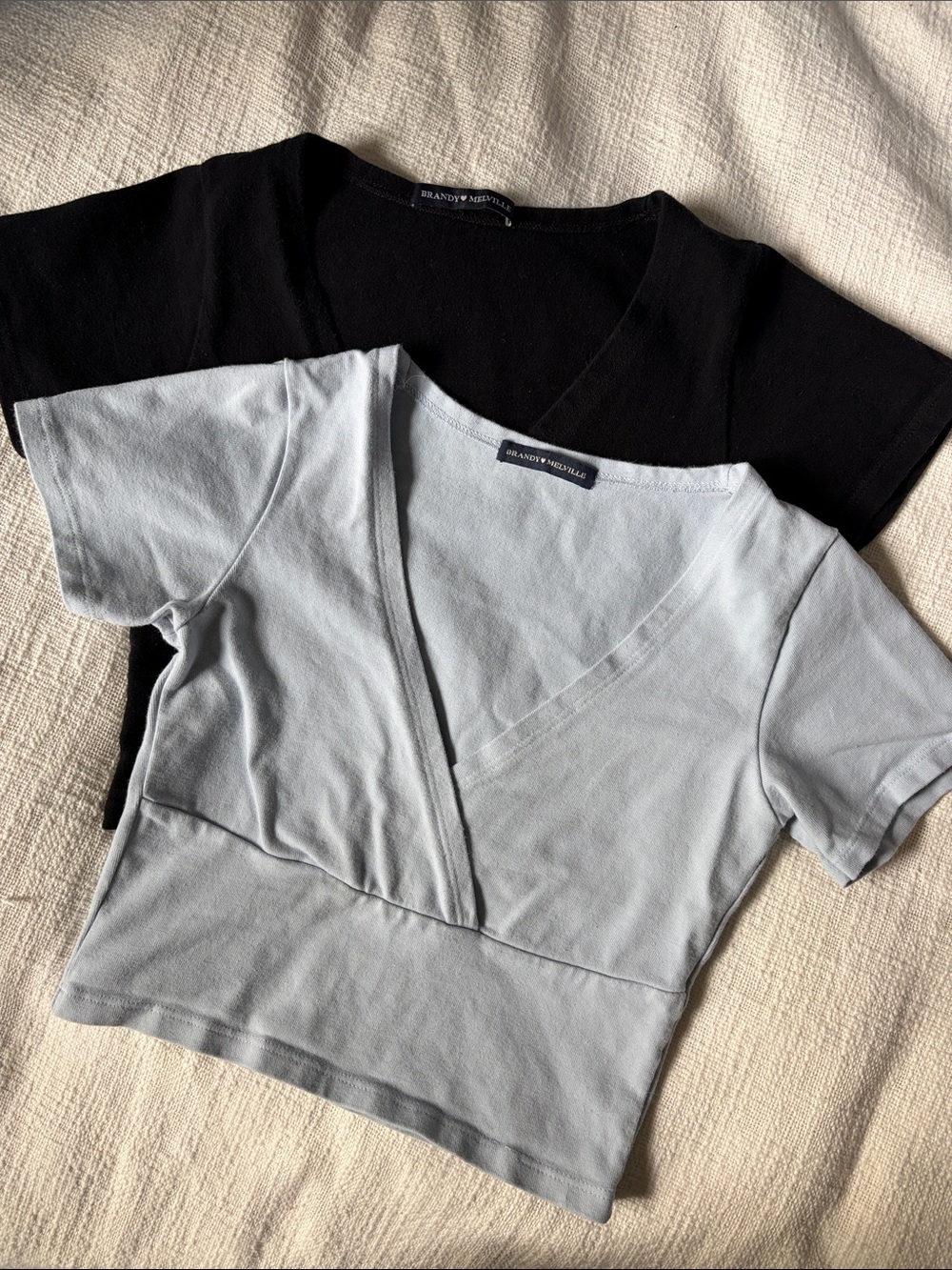 2 Small Brandy Melville Crop Tops - Black and Light Blue